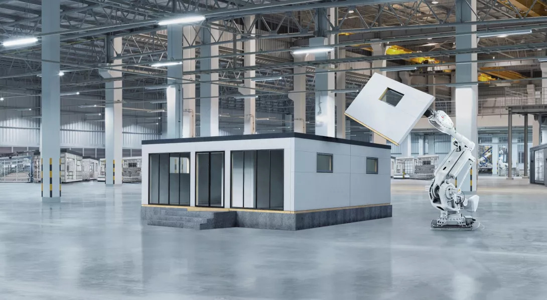 computer-generated image of an ABB industrial robot building modular housing in construction facility