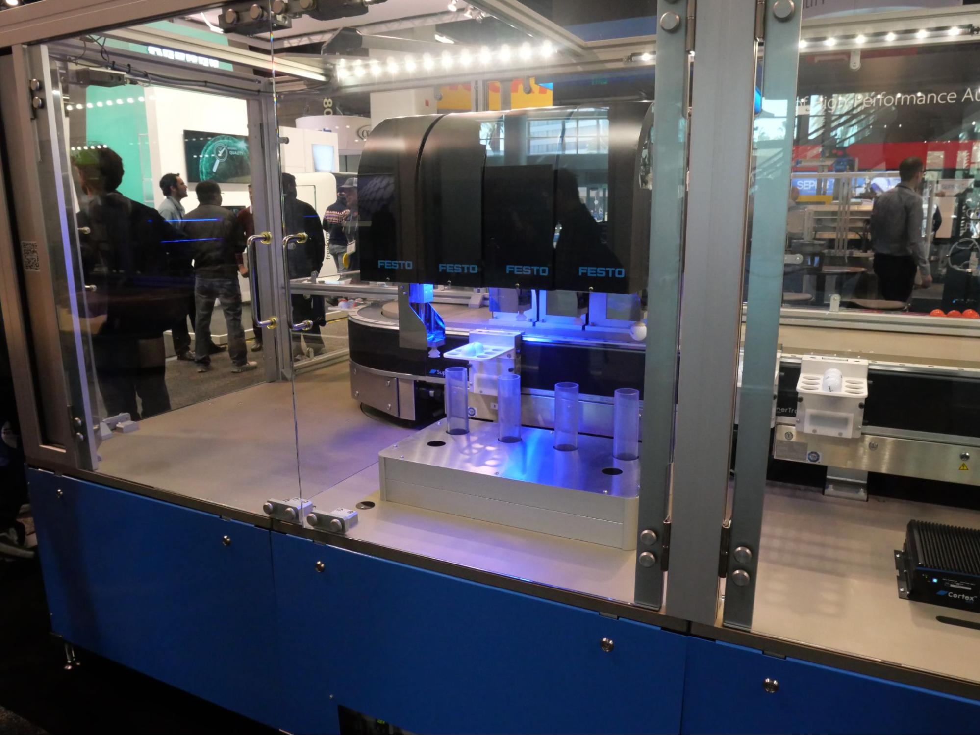 SuperTrak collaborative conveyance with cobot technology and machine vision technology