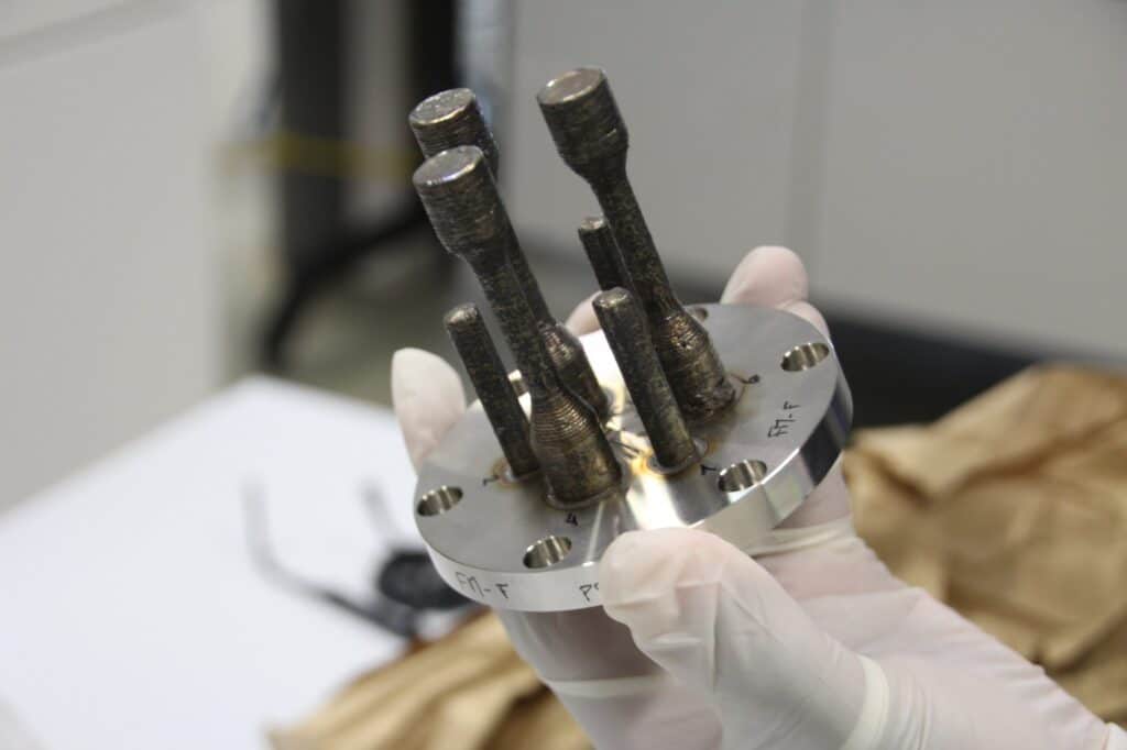 Samples made from AddUp and Airbus’s metal 3D printer before its launch into space.