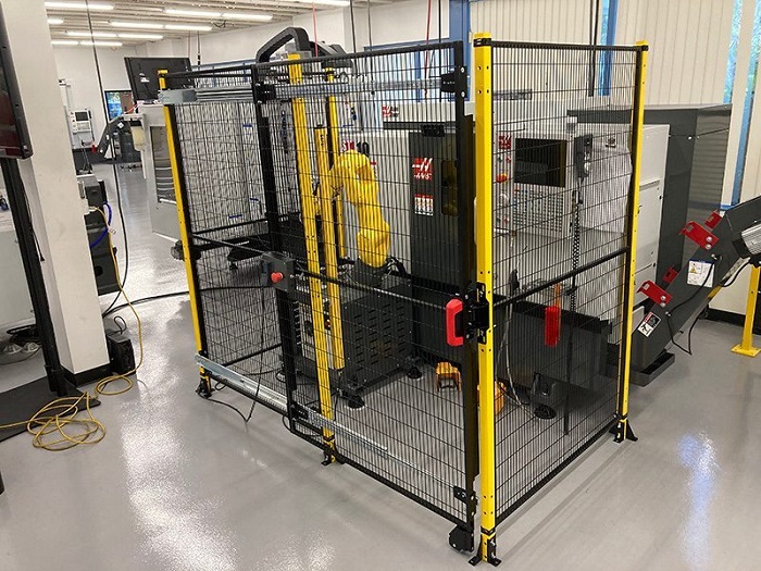 Automation CNC work cell with a robot