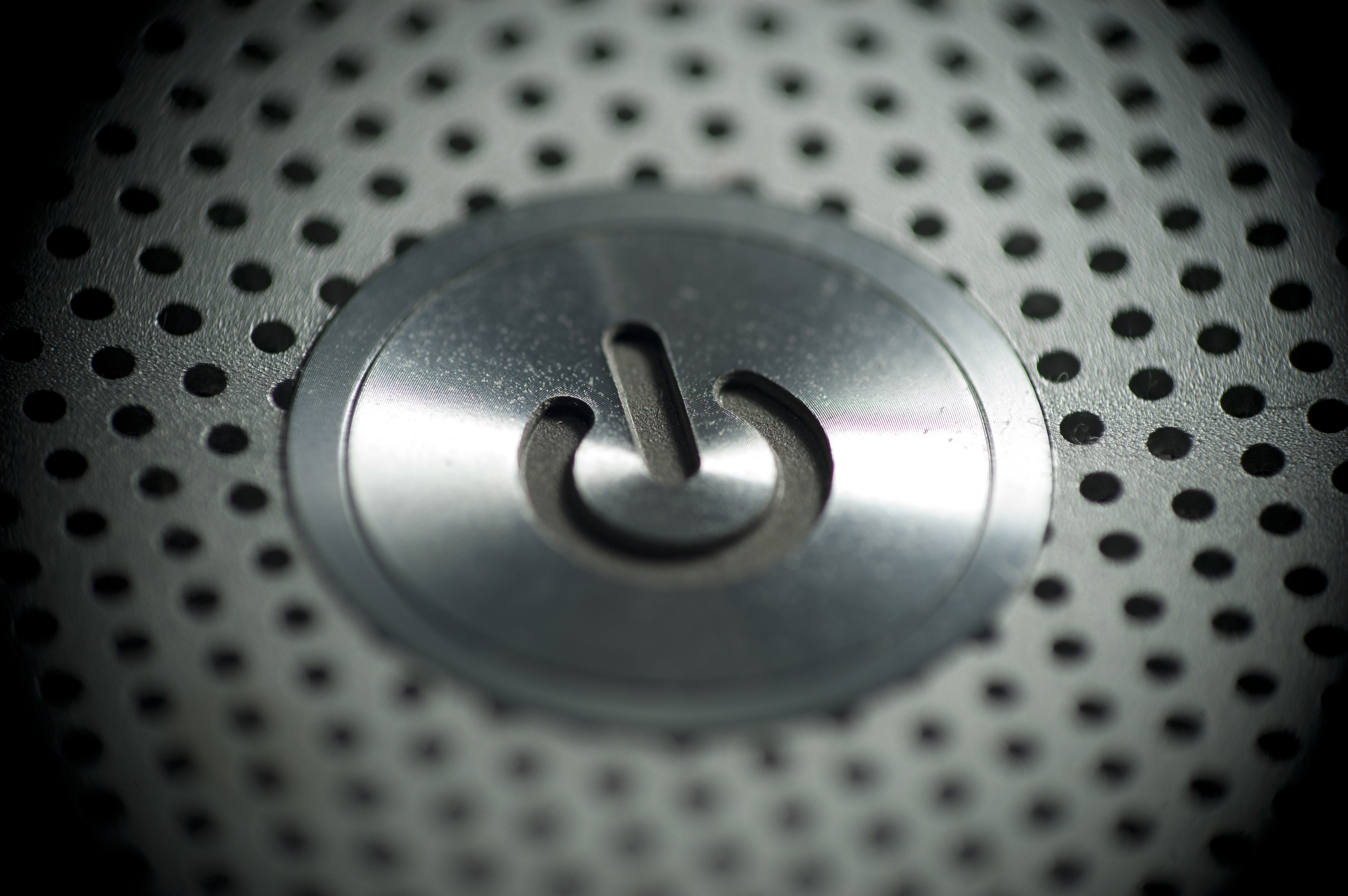 Macbook Pro power is either on or off, true or false, as represented by the one and zero found on the power button