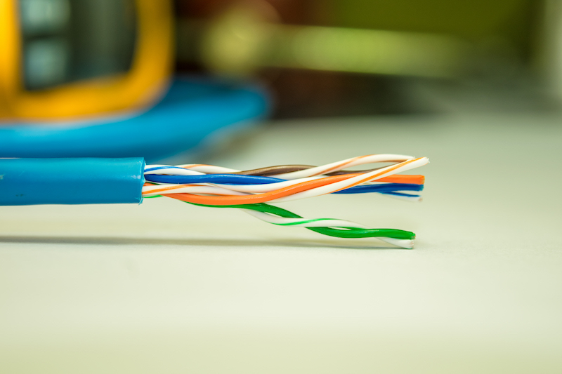 Four pairs of very small gauge solid copper conductors transmit data at high speed between devices inside an Ethernet cable