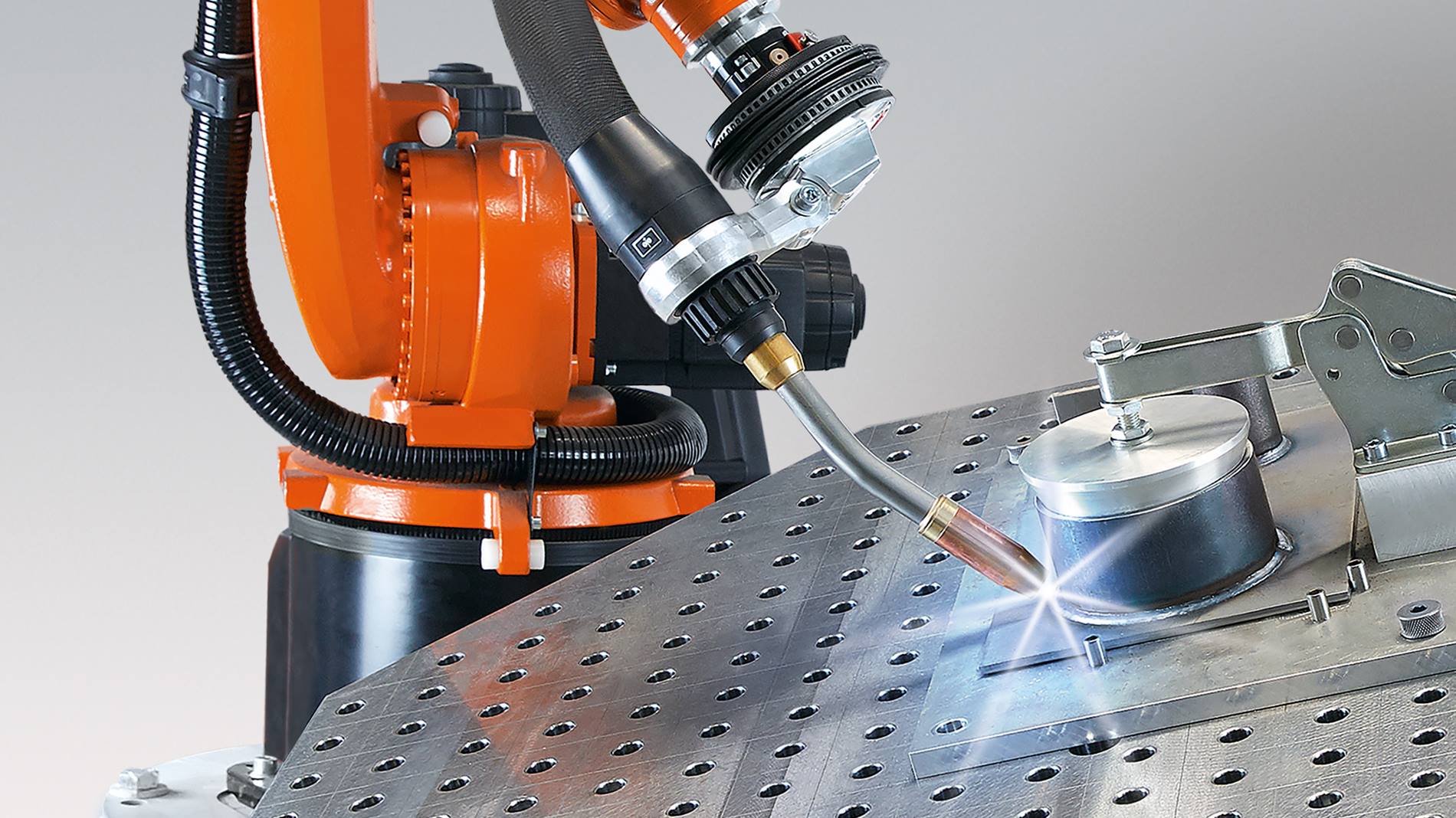 KUKA's arc welding robot with stationary torch as end of arm tool
