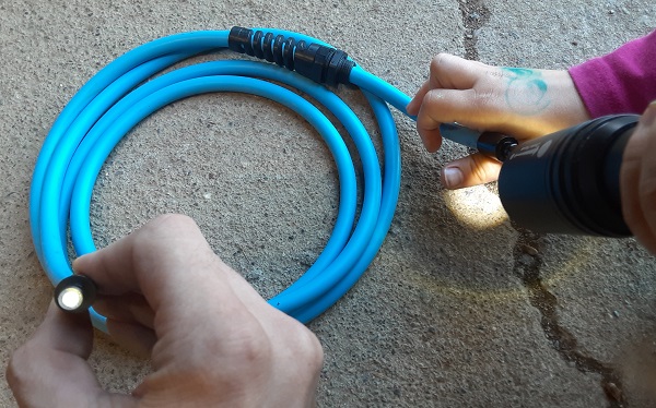 Demonstrating fiber optic light transmission