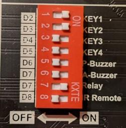 enabling KEY1 and KEY2 DIP switches and the relay-controlled LED