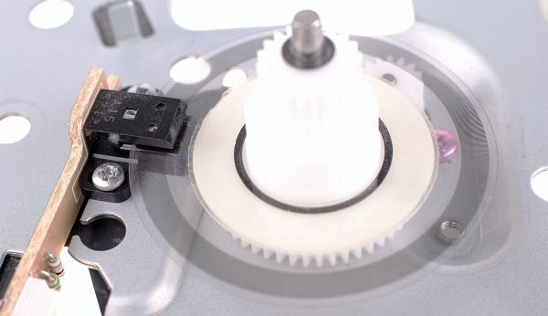 Light and dark encoder pattern on the rotary disk