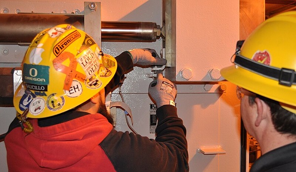 Technician tuning hydraulic system components