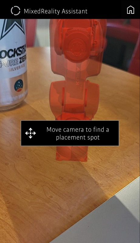 Placement of an AR robot to retrieve a soda can