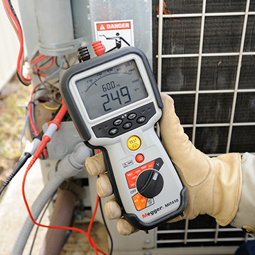 A handheld digital megaohmmeter