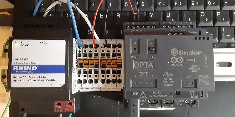 Arduino Opta PLC simple test bench. USER button is programmable input for this intro project