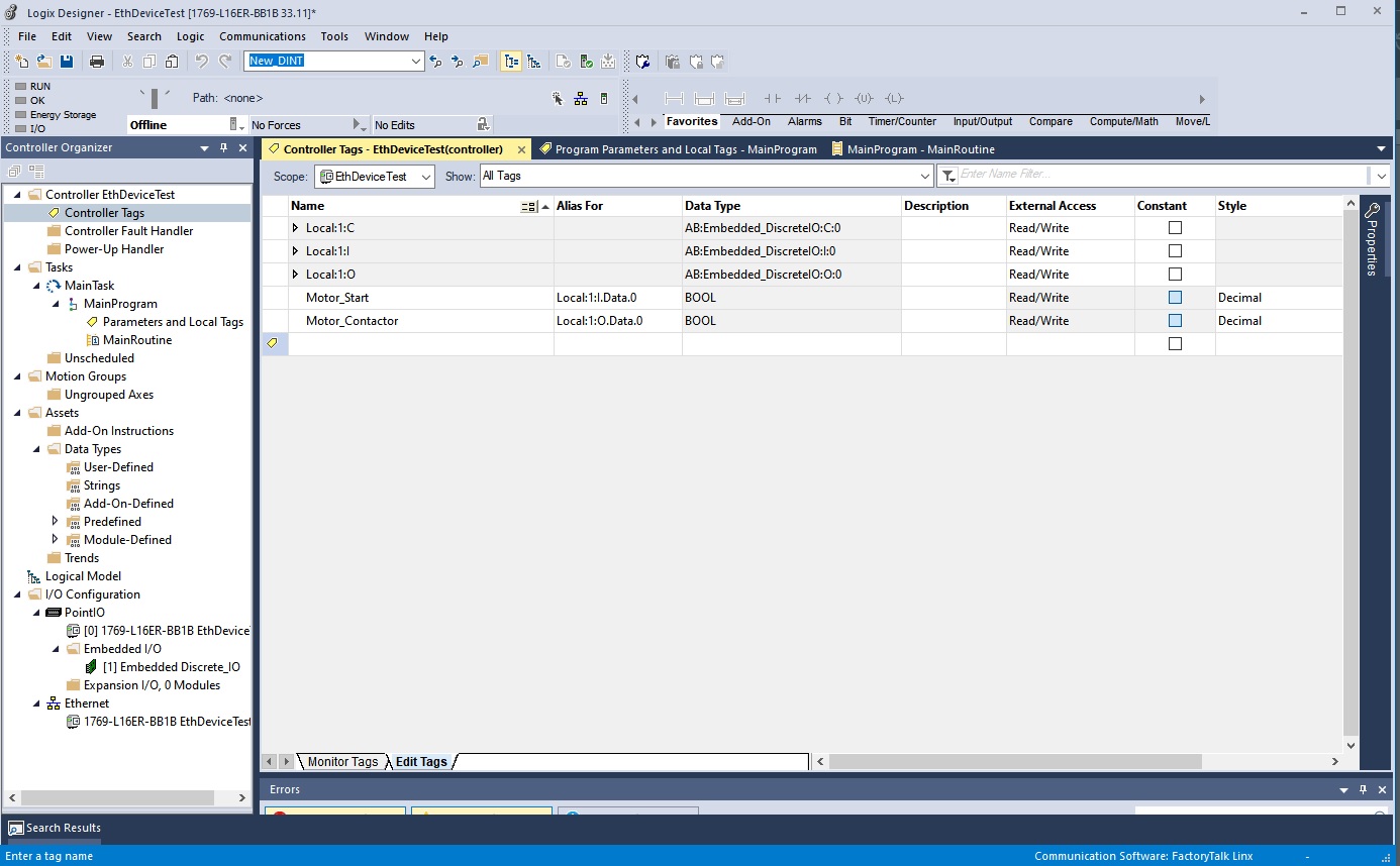 PLC program with global and program scope tags