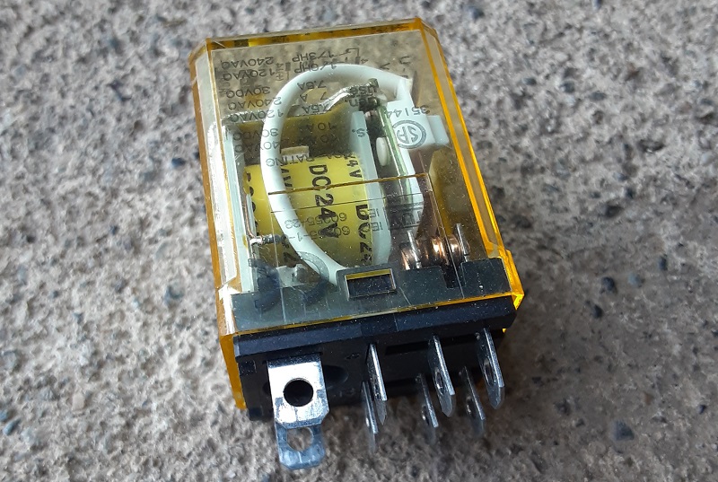Close up view of a mechanical relay with PCB mounts