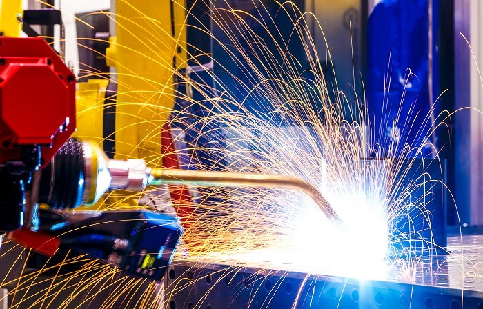 A robot in a welding environment