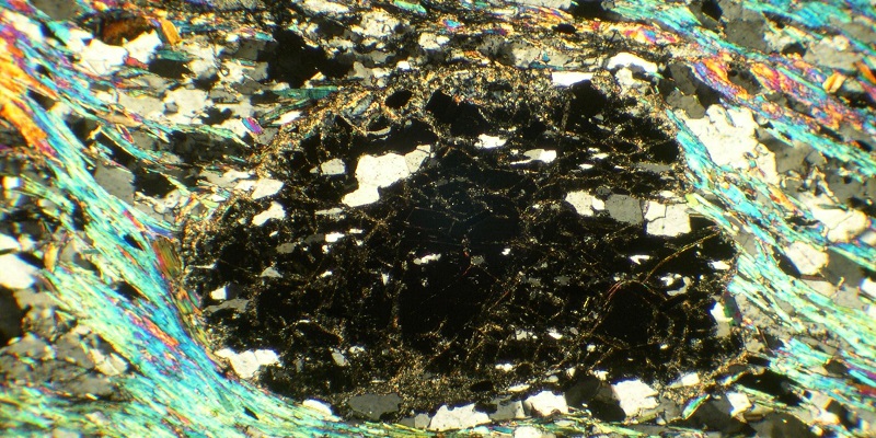 microscopic view of material that shows mixed material solidified as cystals
