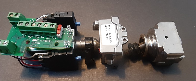 Detail of electrical, solenoid, and mechanical interactive components