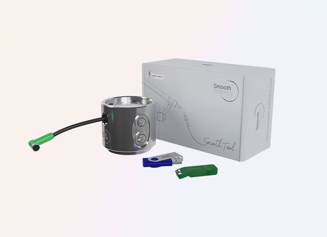 The SmoothTool cobot welding package comes with a programming flange, installation guide, license USB key, and software USB key for set up.