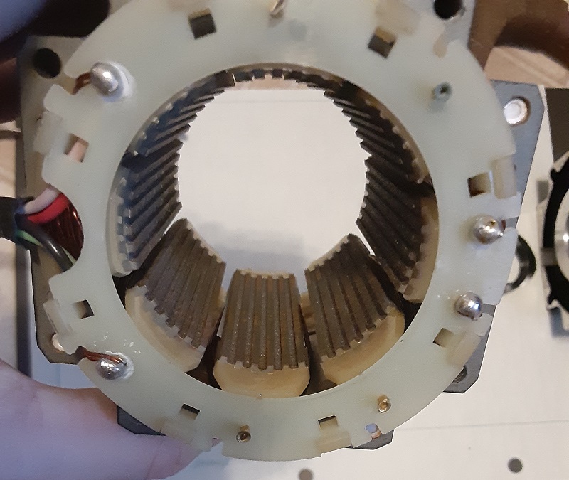 Step motors have many poles distributed around the outside of the stator