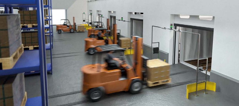 Forklifts moving product in a factory