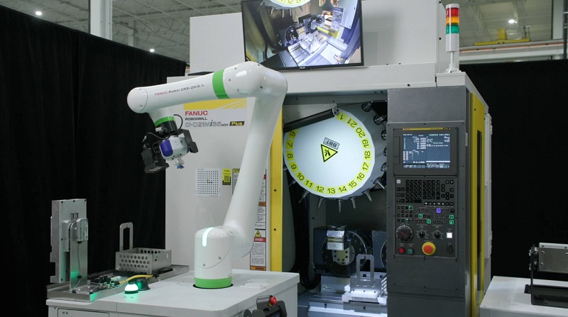 Wireless sensors on a CNC machine tending robot