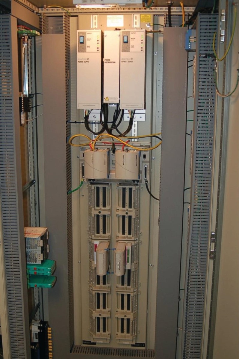 Emerson Ovation DCS rack vertically-oriented backplane accepting multiple I/O modules