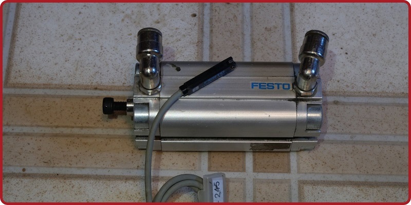 small pneumatic cylinder with the position sensor shown removed