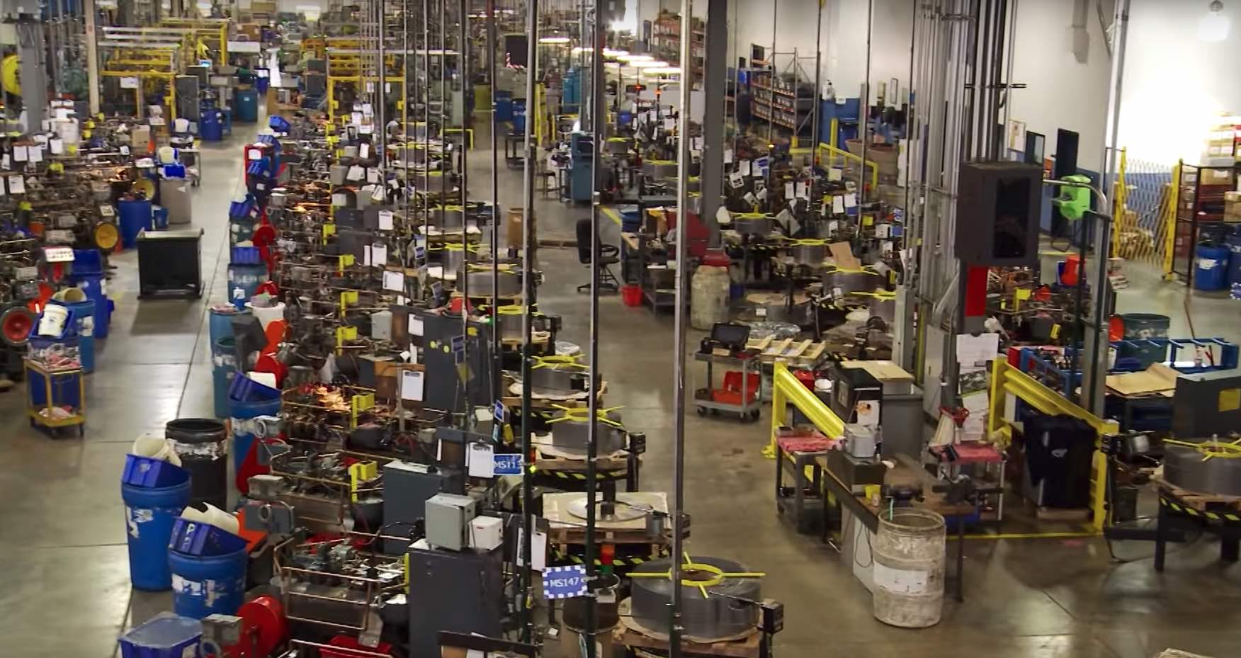 Keyence displaying vision systems on factory floor. 
