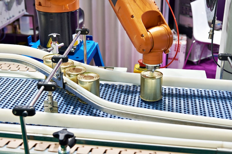 robot working on a conveyor belt