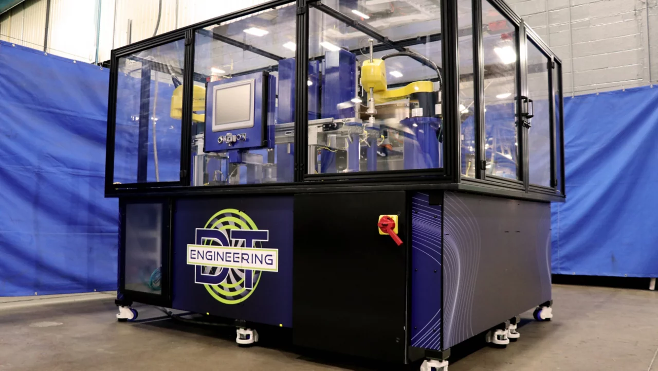 The DC Engineering booth displays Rockwell Conveyor systems in action.