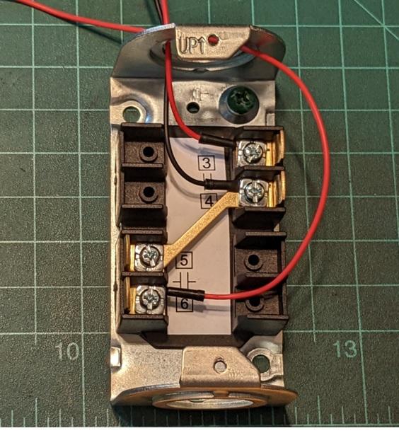 attachment of electrical wires to the control station switch box