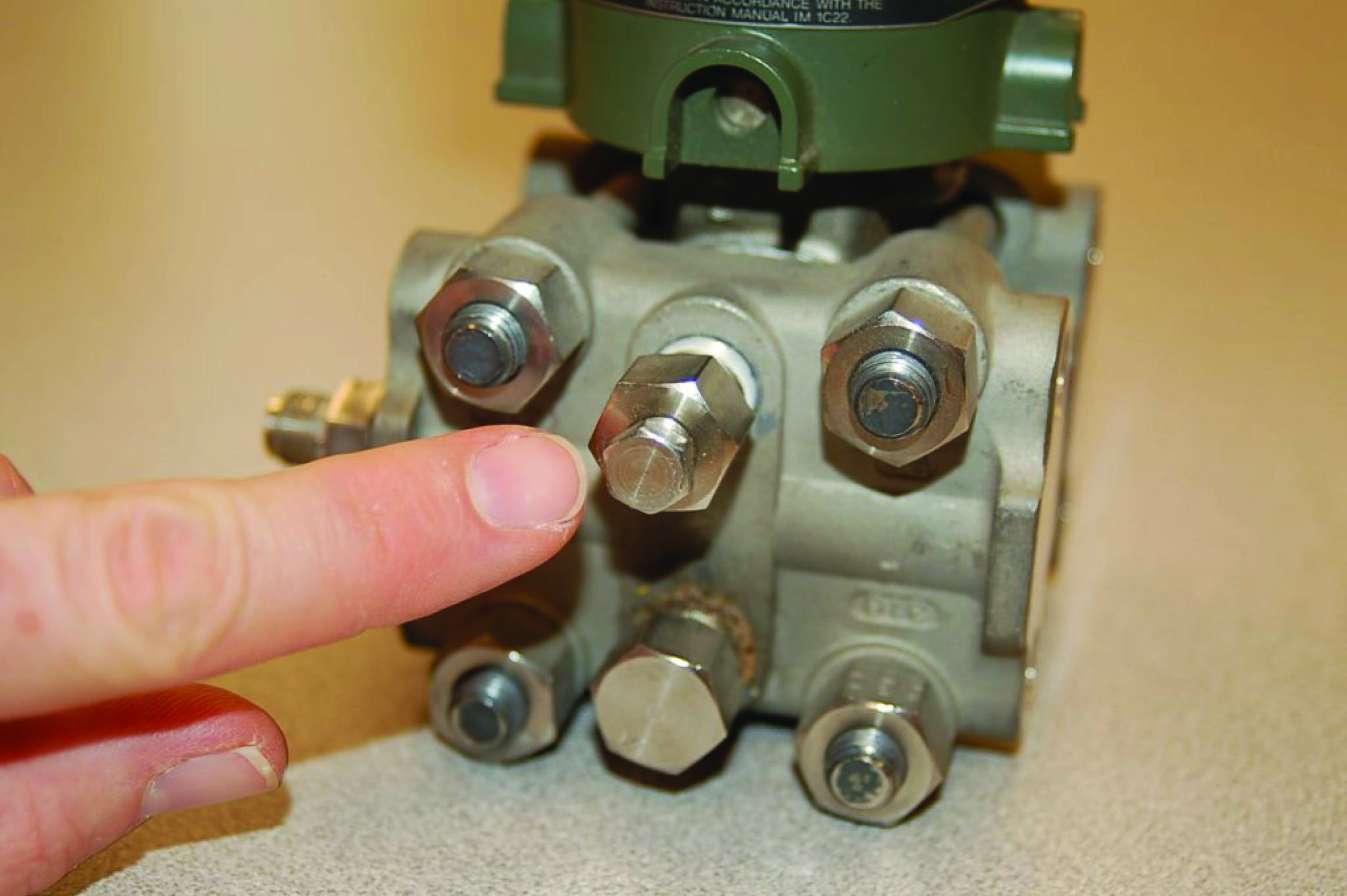 Close-up views of a up bleed fitting