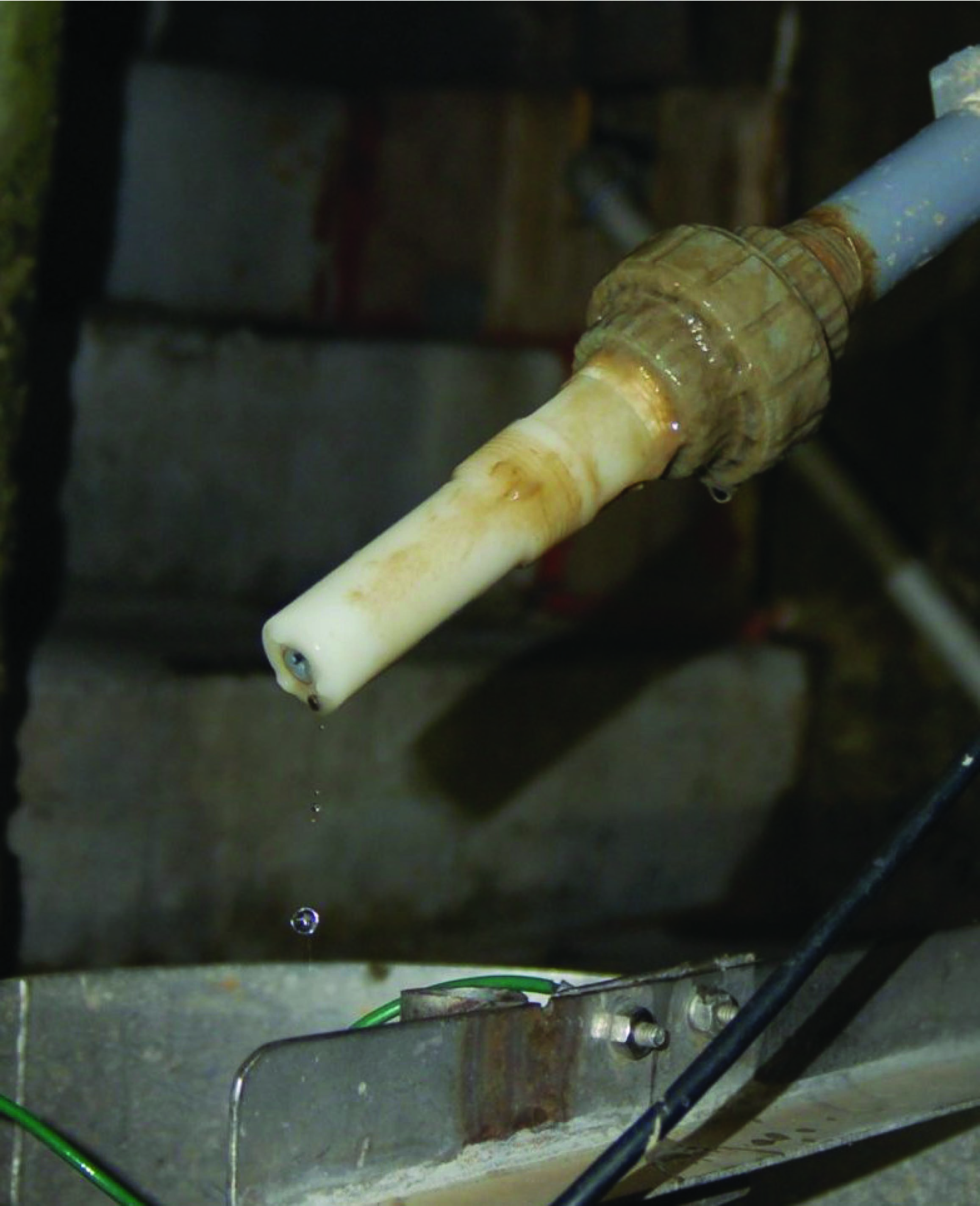 open-top stainless steel tank where the pH probe hangs