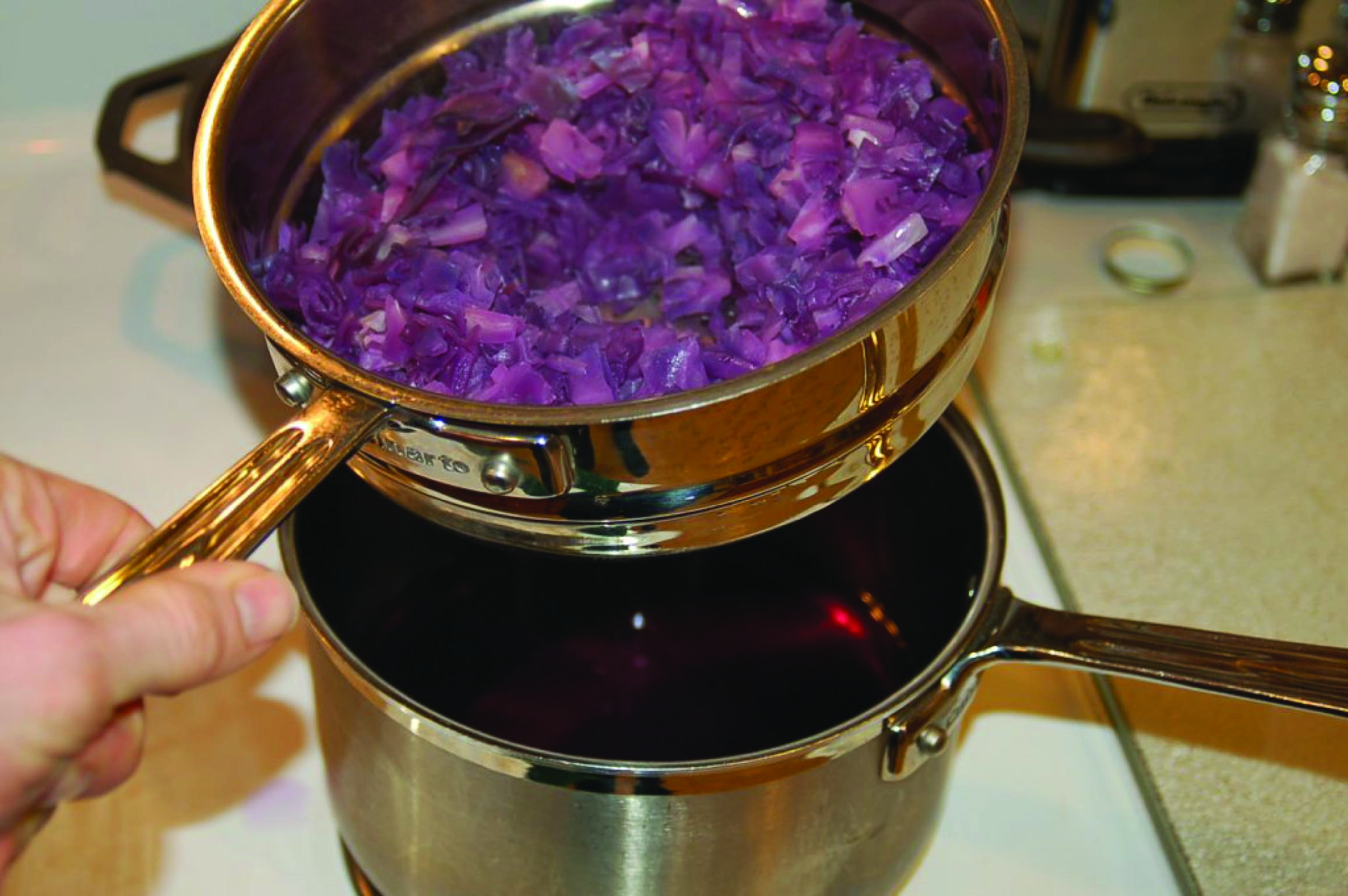 liquid collected from the cabbage in a steaming pot