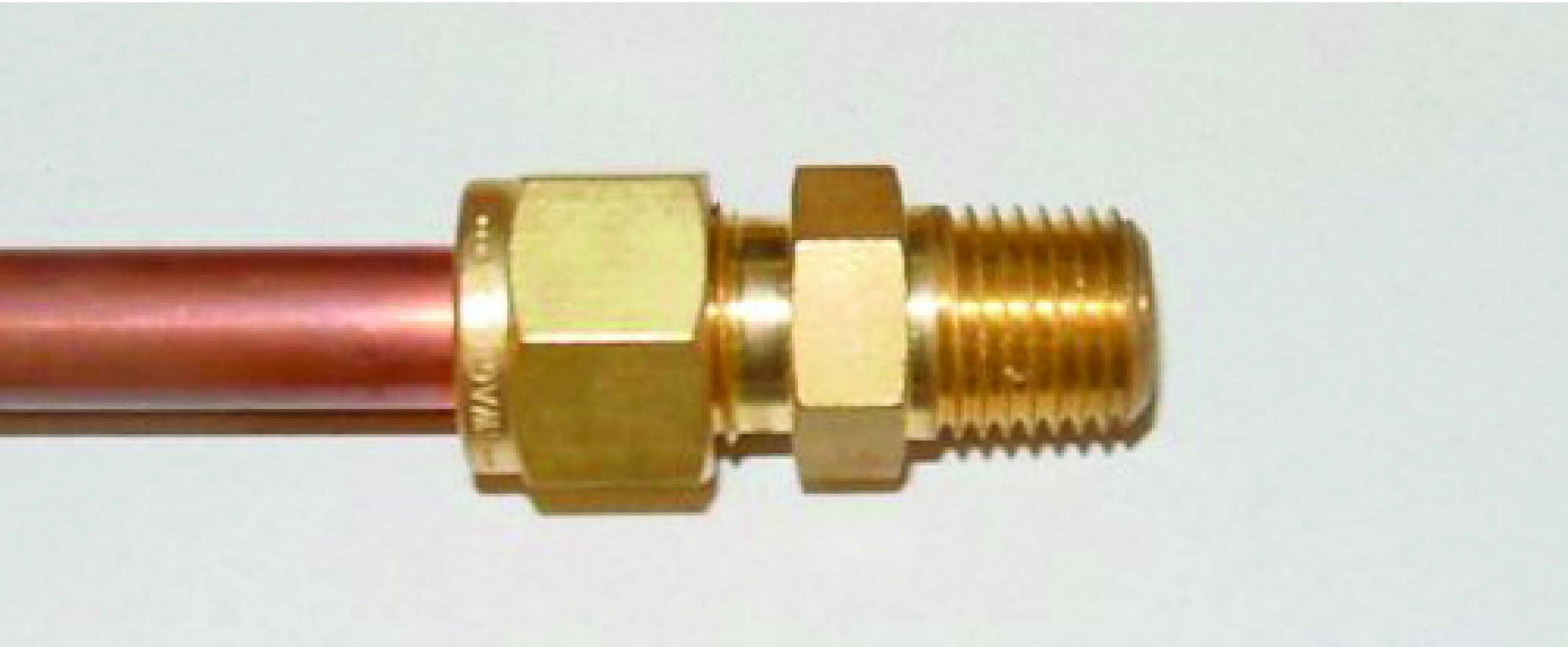 slightly crimping the tube thereby locking the ferrules in place
