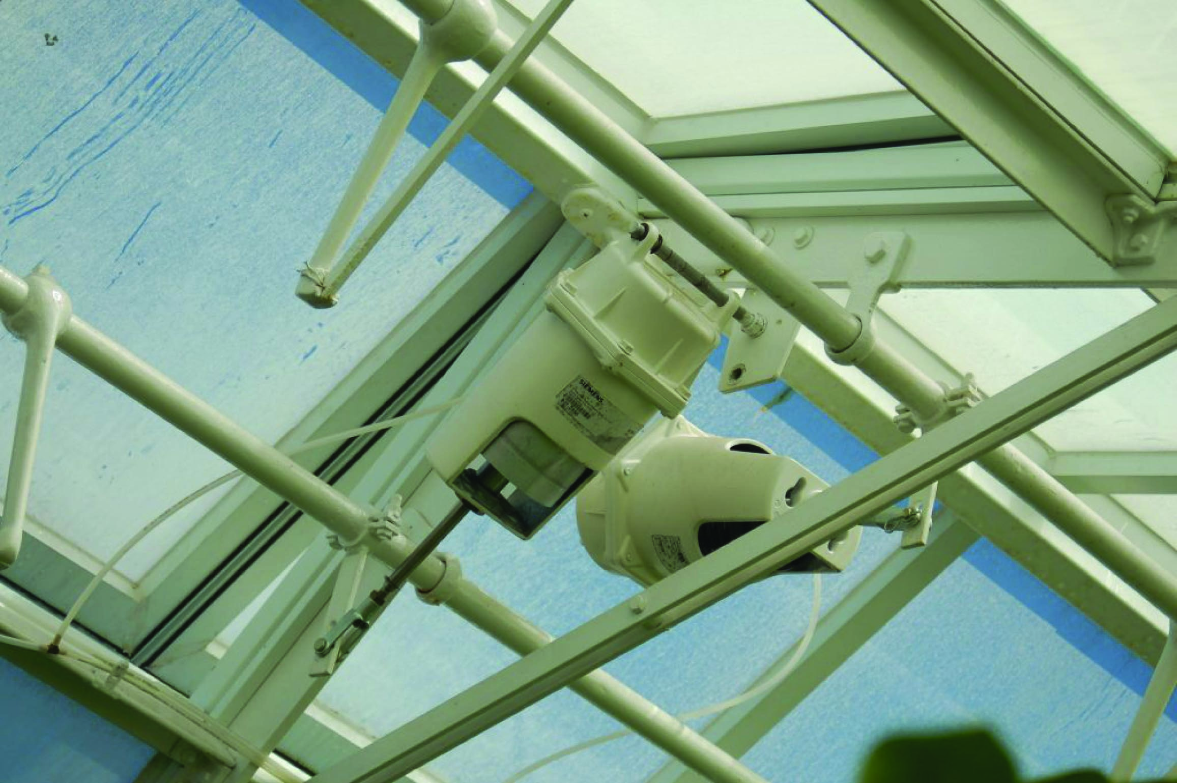 greenhouse vents actuated by pneumatic (air-powered) piston actuators